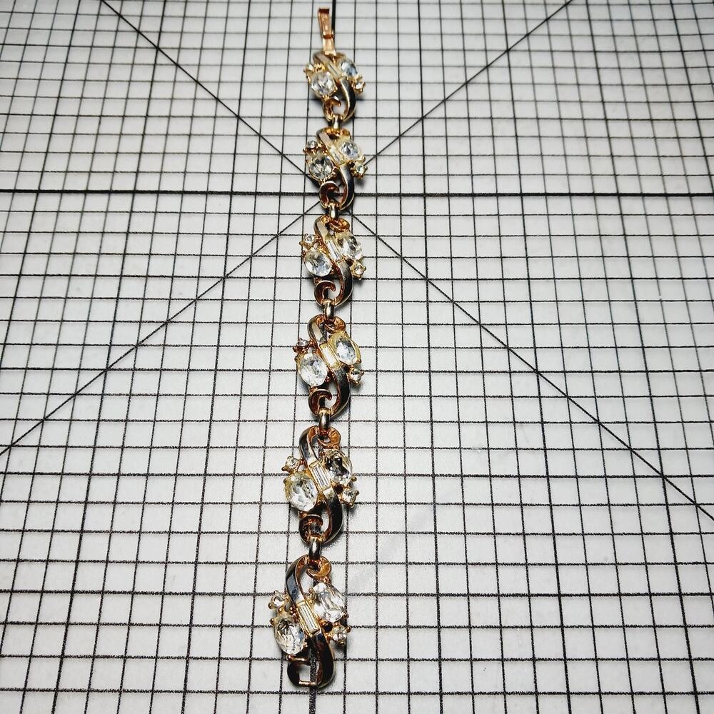 Bracelet VTG Trifari Pat Pend Clear Rhinestones Gold Tone Ribbon Link Glam 60s